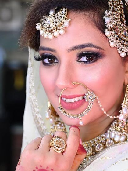A bright and happy bridal portrait, where the bride's beautiful smile is the best accessory.