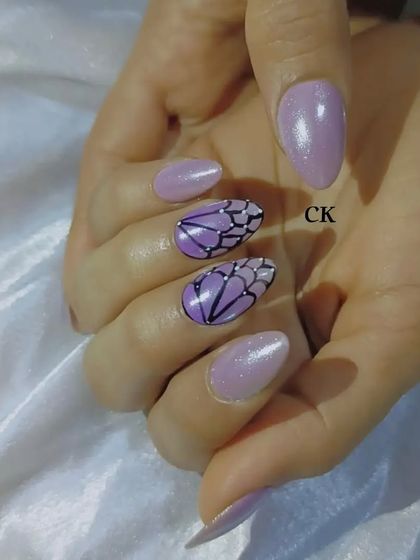 A beautiful butterfly-wing inspired design on a shimmery lavender base.