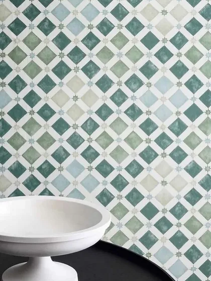 We like our greens sojourned on a wall. This geometric tile-patterned wallpaper in shades of green and white offers a fresh, clean, and modern aesthetic, perfect for a bright and airy room.
