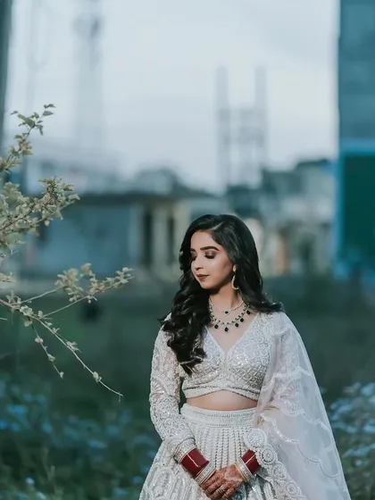 A beautiful, dreamy portrait of my reception bride Roop. The soft, smokey eye and nude lip create a romantic and elegant look.