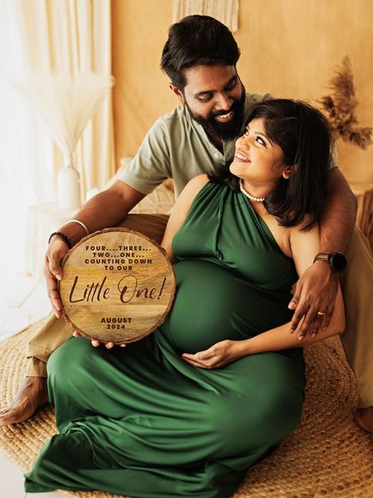 A special announcement. Using a custom wooden plaque is a wonderful way to share your due date and add a personal touch to your photos.