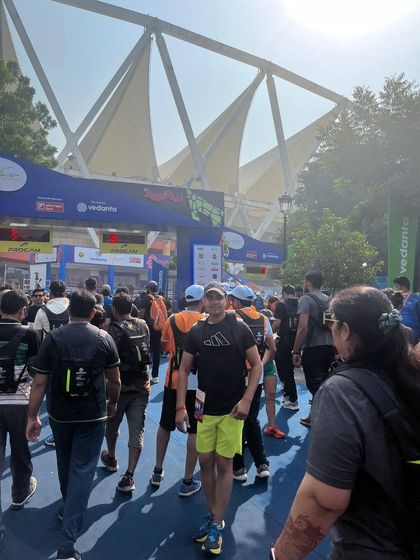 At the starting line of the Vedanta Delhi Half Marathon, surrounded by the energy of fellow runners.