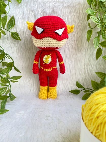 The Flash! This superhero doll was made with a special head shape as requested by the customer. I love getting the details right, like the lightning bolt emblem on his chest.