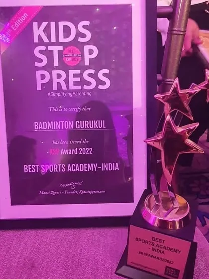 A close-up of the KSP Award trophy and certificate for 'Best Sports Academy - India'. This is a testament to our structured curriculum and quality management.