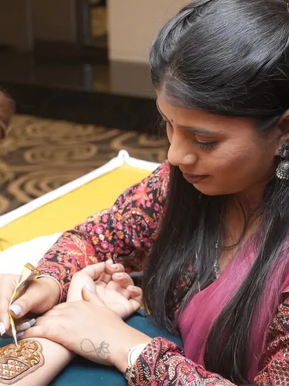 A close-up of me demonstrating a design during a seminar.