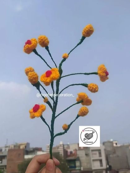 A single stem of our whimsical winter sweet flower, with small yellow buds and red centers.