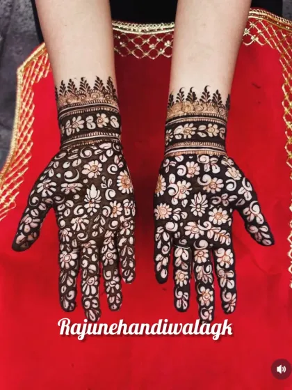 A delicate and pretty design with small flowers covering the entire palm, perfect for someone who wants a lighter, more feminine look.