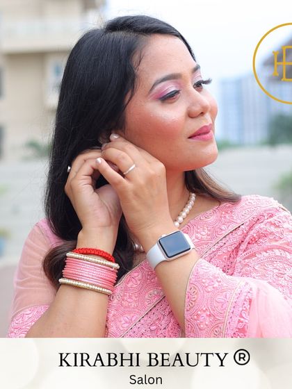 The final look for a client in a pink saree. She looks elegant and ready for her event with her soft makeup and simple pearl necklace.