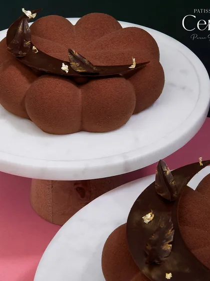 A closer look at the Chocolate Dreams entremet. It's a decadent blend of rich chocolate, smooth caramel, and a touch of hazelnut.
