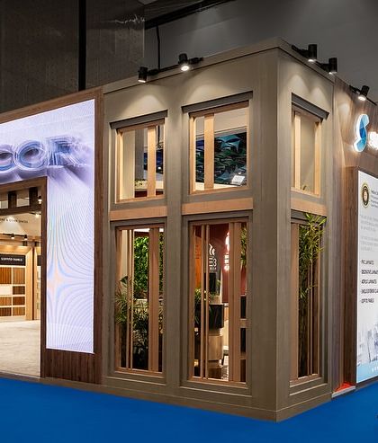 The exterior facade for the Skydecor portion of the exhibition stall features a more classical design with window-like frames. This approach creates a welcoming, storefront-like appearance that invites visitors inside.