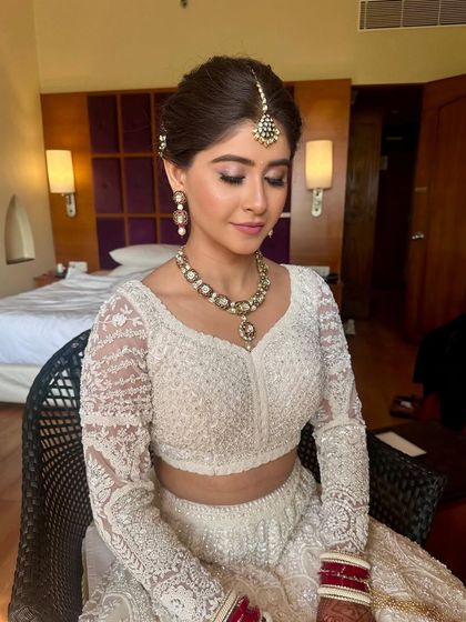 Timeless Bridal Buns & Updos photo 11