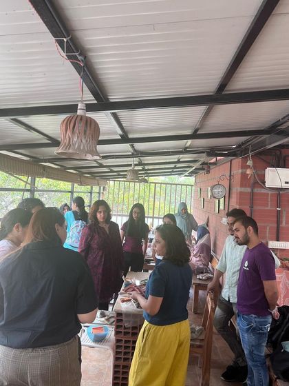 More moments from our corporate workshops. I love seeing colleagues encourage each other and discover their hidden artistic talents during these team activities.