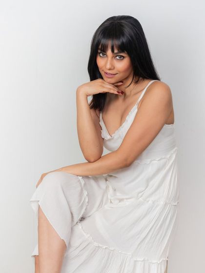 A confident pose showing off the final look with our clip-in front bangs. They provide a fresh, stylish update that looks completely natural and feels lightweight.