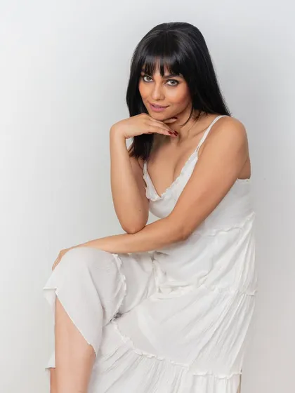 A confident pose showing off the final look with our clip-in front bangs. They provide a fresh, stylish update that looks completely natural and feels lightweight.