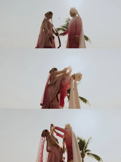 A cinematic sequence of the couple's varmala exchange against a bright, sunlit sky. The silhouette effect creates a dramatic and timeless series of images.