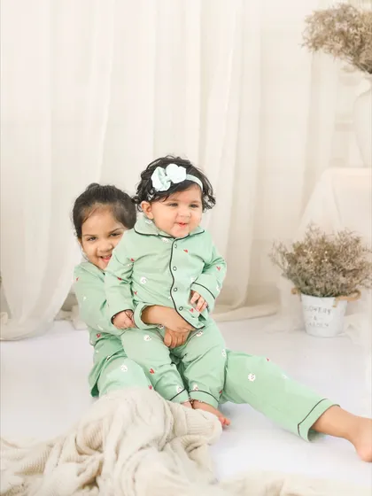 A big hug from big sister. These cozy, playful moments are what make sibling sessions so special.