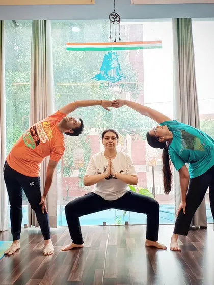 Celebrating the spirit of unity and freedom in our studio, with students creating a beautiful group pose.