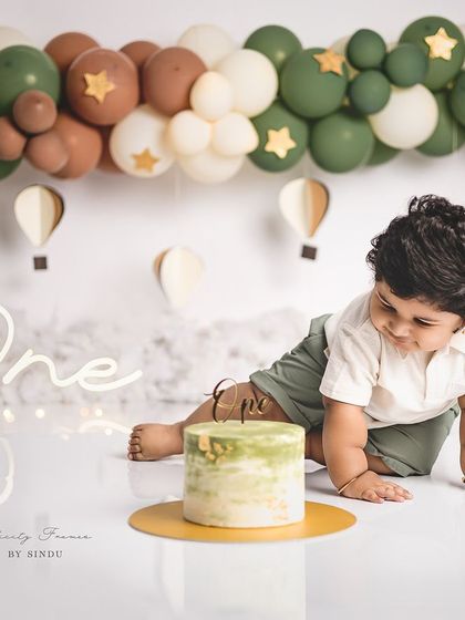 Getting ready to dig in! The moment of anticipation right before the cake smash is always a fun one to capture.