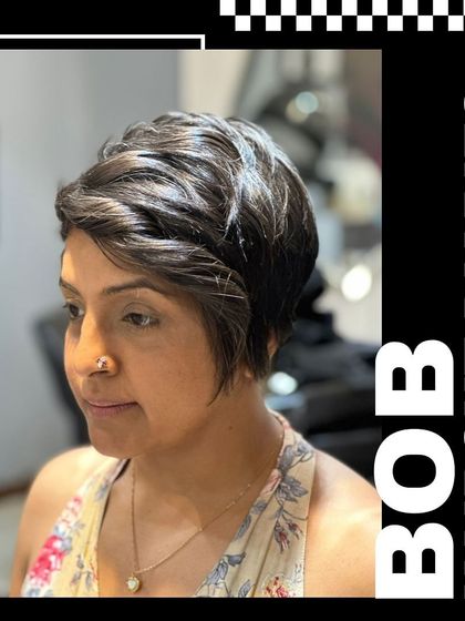 Another angle of the pixie bob, demonstrating its versatility and how it can be styled for a soft yet edgy look.