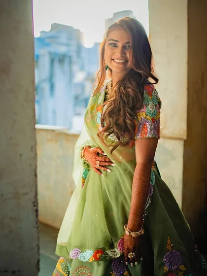 Another lovely shot of the bride with her half-up wavy hairstyle, looking effortlessly beautiful.