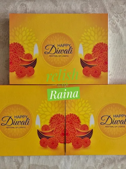 My vibrant yellow "Happy Diwali" gift box sleeves. The festive packaging adds a special touch to your gifts.