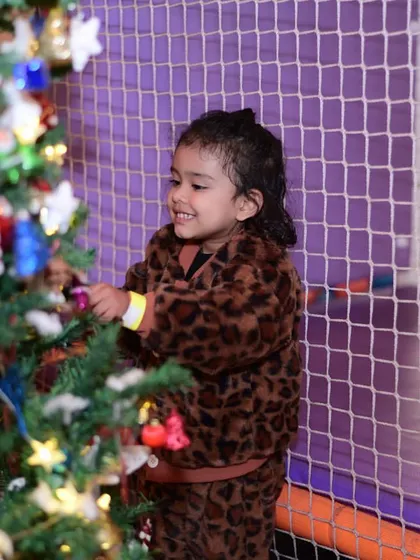 The magic of decorating a Christmas tree. We love providing hands-on activities that let kids be part of the festive spirit.