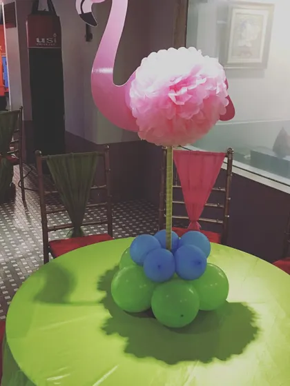 I can work with any party theme. For this event, the host chose a fun flamingo theme, and you can see the colorful table centerpieces that added to the festive decor.