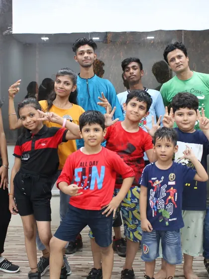 The gang's all here! A mix of our junior and senior students posing after a joint practice session.