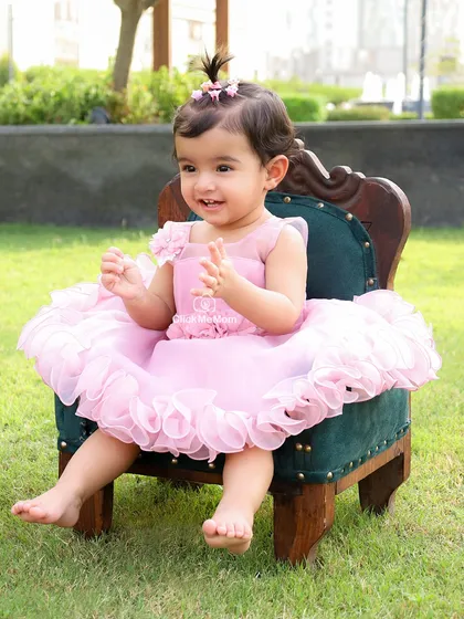 There's something magical about natural light. This outdoor portrait captures the sweet, happy spirit of this little girl enjoying a beautiful day in the park.