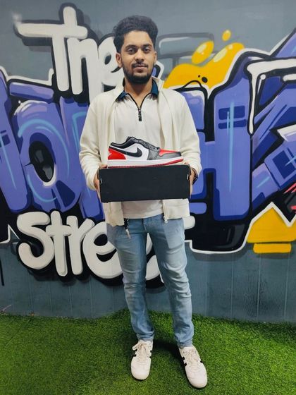 Copped a classic. The Jordan 1 Low 'Bred Toe' is always a solid choice.