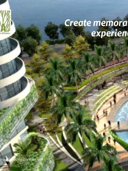An aerial view of a commercial waterfront development, designed to create memorable experiences. The terraced landscaping, green roofs, and integrated water features provide a stunning backdrop for social and recreational activities, making the complex a city landmark.