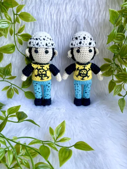 Here is Trafalgar Law, another character from One Piece. I paid close attention to his signature spotted hat and even his tiny ear piercings to make this anime replica authentic.