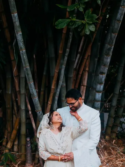 A quiet moment of connection amidst nature. This artistic couple portrait showcases our ability to use dramatic lighting and natural settings to create a romantic, intimate photograph that feels both timeless and modern.