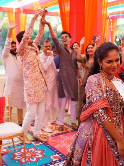 The groom and his friends celebrating with full energy during the Mehendi carnival.