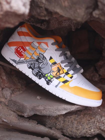 The other side of the "Under Construction" custom Nike Jordans, featuring a cement mixer truck and bold, graphic warning signs. This was a fun challenge that pushed me out of my comfort zone.