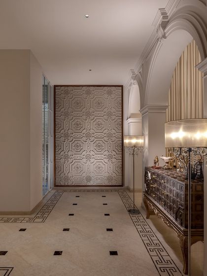 This corridor is more than just a space, it is an experience. We incorporated intricate Art Nouveau touches, a large textured art panel, and classic furniture to create a passageway that feels like a private art gallery.