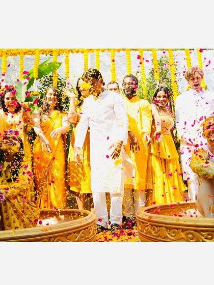 A vibrant snapshot of family and friends joining in the Phoolon ki Holi. These are the moments that create lasting memories, bringing everyone together in a colorful, fun-filled celebration before the main wedding day.