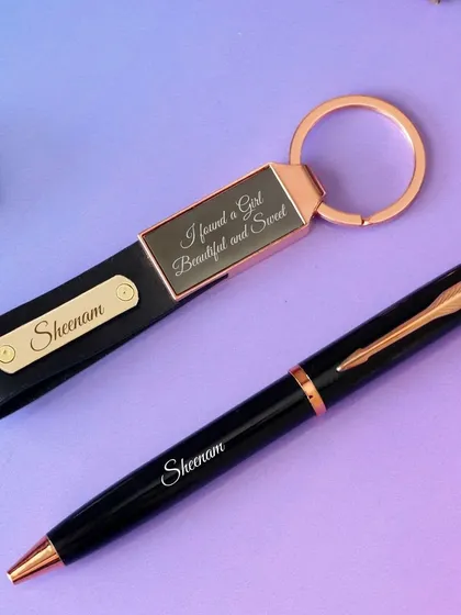 This premium set includes a personalized metal pen and a matching leather strap keychain. The keychain can be engraved with a name on the front and a special message on the back.