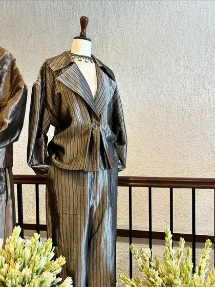 Festive wear, but elevated. This metallic, striped co-ord set with a structured jacket is for the woman who isn't afraid to stand out.
