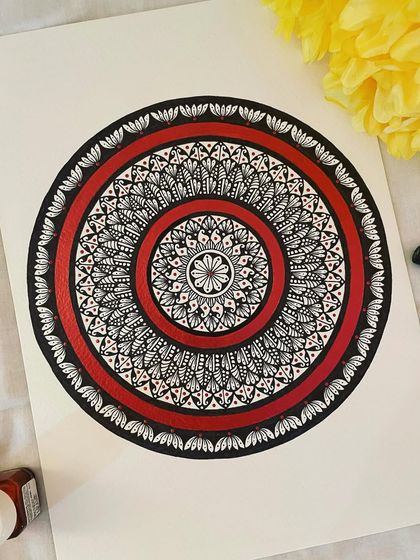 Explore the intricate patterns of my imagination. This bold piece uses a strong red circle to create a powerful focal point, surrounded by delicate black and white details.
