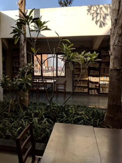 At the Vidyamandir School, we designed the library around an open-to-sky courtyard, bringing a small garden directly into the heart of the learning space. This integration of nature creates a tranquil and stimulating environment for students, promoting focus and well-being.