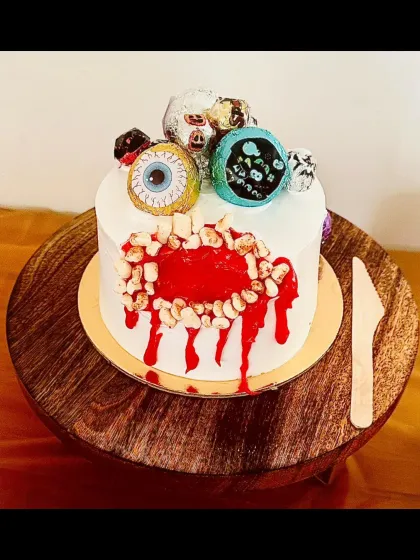 A spooky and creative Halloween-themed cake, showing that I can cater to any theme, no matter how unusual!