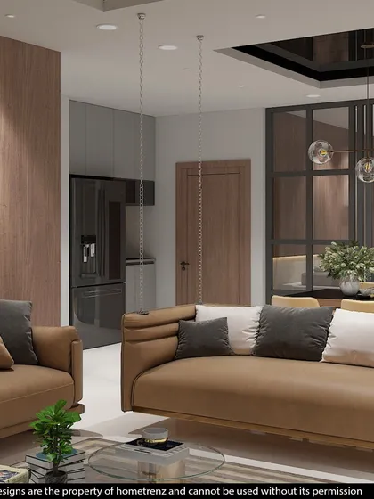 A large, open-plan dining and living area. The design uses a consistent color palette and materials to create a sense of flow and spaciousness.