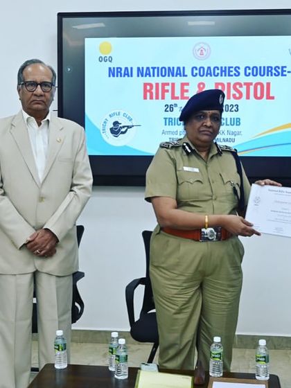Coach Raksha receiving her NRAI Coaching course completion certificate.
