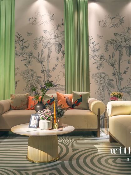 The lounge area of 'The Conservatory' at night, glowing with warmth and elegance.