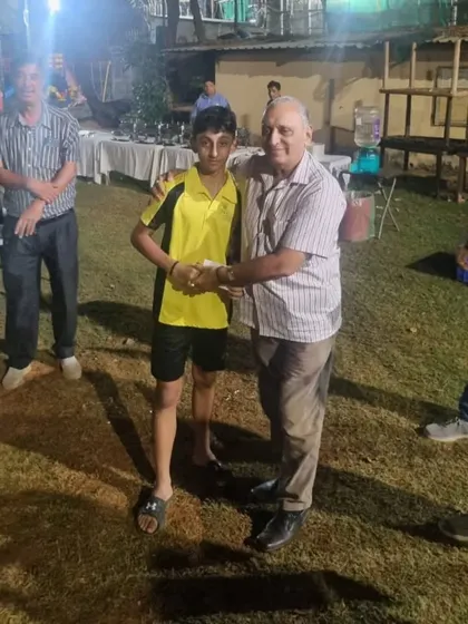 Zehn Masani receiving one of his awards at the Parsi In-house Badminton Tournament, where he won a double crown.