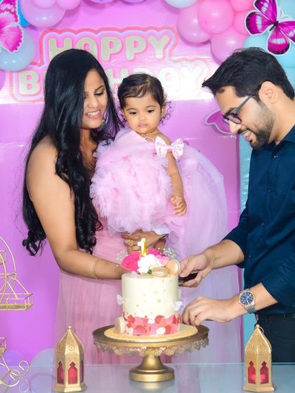 A magical 'Frozen 2' themed birthday party, transforming the venue into an enchanted forest with earthy tones, character cutouts, and shimmering backdrops.