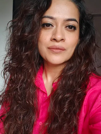 A pop of color can change everything. Here, a bright pink shirt inspired me to keep my makeup simple and fresh, with a soft pink lip to match.