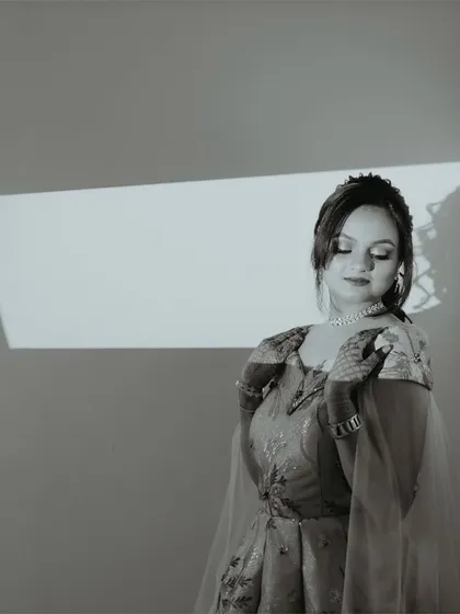 A soft, black and white bridal portrait using projected light to create a gentle and atmospheric mood.
