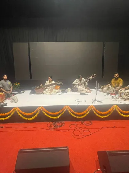 Getting set for our concert at Chowdaiah Memorial Hall. The stage is ready, and we are doing our final checks before the show begins.